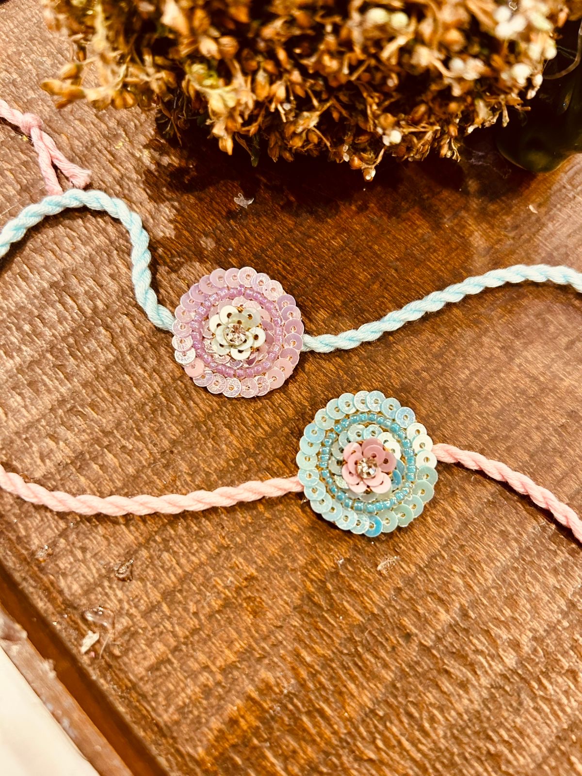 N-06 Designer Pastel Sequin Rakhi for Bhai β Handcrafted & Elegant Festive Thread