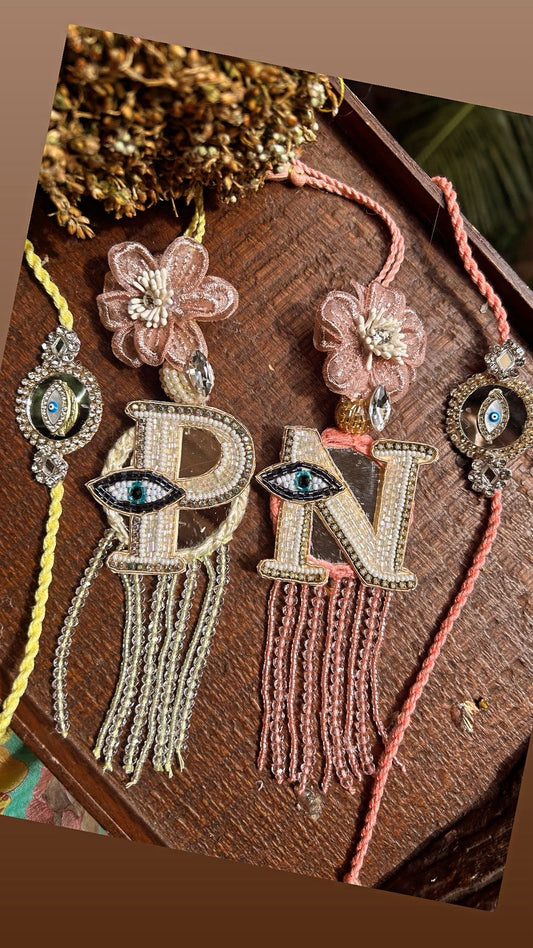 N-10 Evil Eye Alphabet Lumba with Matching Rakhi – Personalized Bhabhi & Bhai Rakhi Set