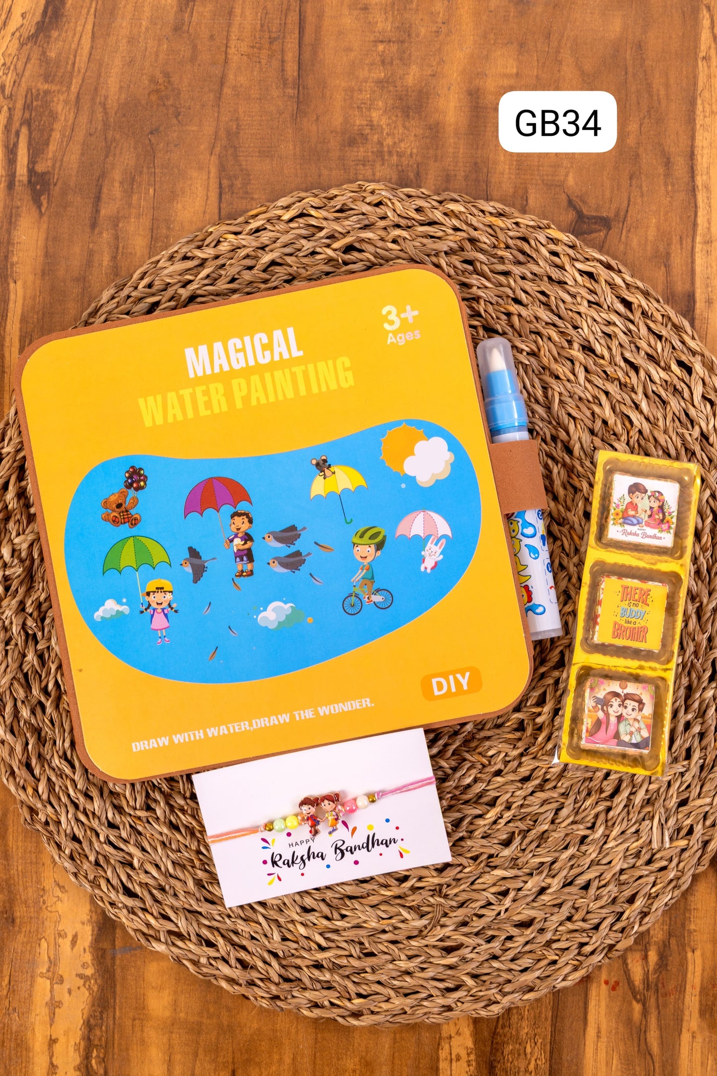 GB 33- GB 36 🎨 Raksha Bandhan Magical Water Painting Gift Set – Rakhi, Chocolates & Activity Book (Age 3+)