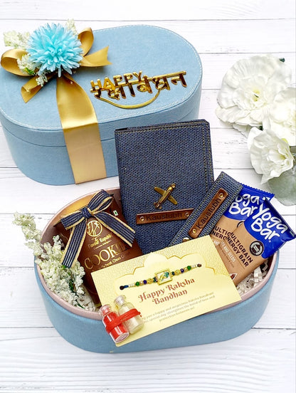 Denim Rakhi Hamper for Brother – Personalised Passport Cover, Keychain, Snacks & Morpankh Rakhi in Denim Box
