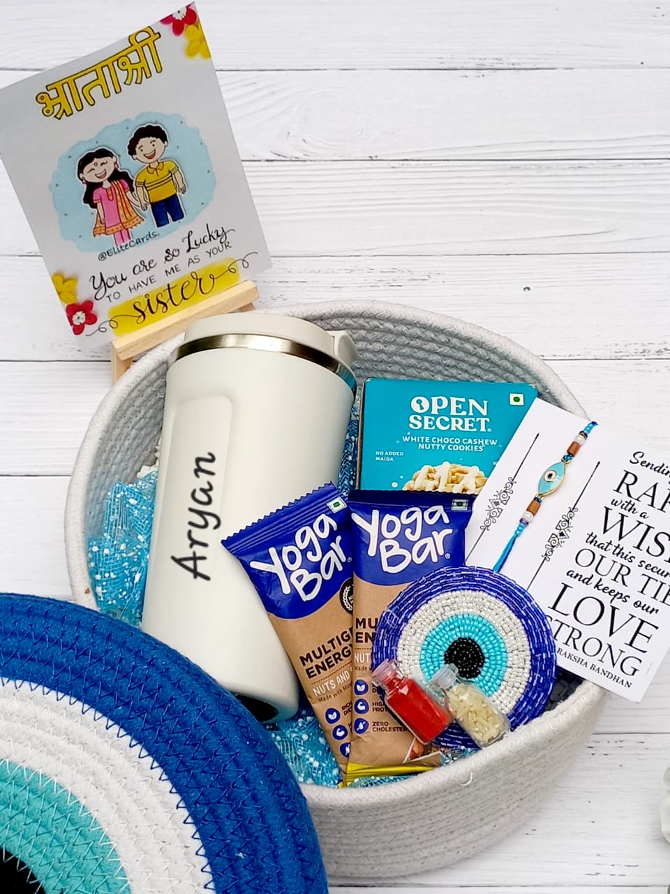 Evil Eye Rakhi Hamper for Brother – Personalised Temp Coffee Tumbler, Cookies, Protein Bars & Rakhi in Keepsake Box