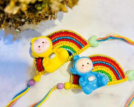 KN-35 🌈 Hello Teletubbies Rainbow Rakhi for Kids – Colourful Rakhi with Rainbow Motif (Reusable)