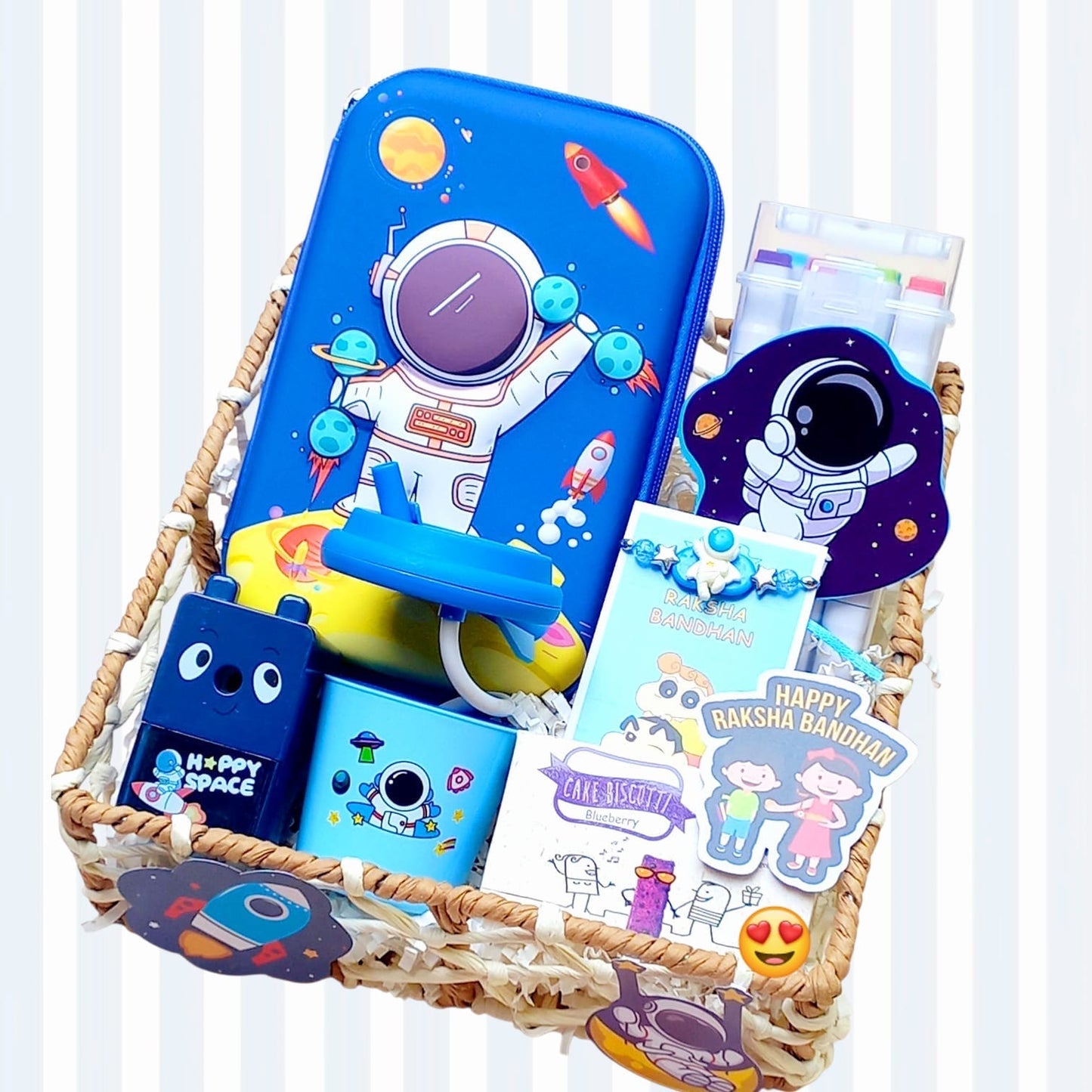 Space Theme Rakhi Hamper for Kids – Astronaut Rakhi, Smiggle Stationery, Lamp & Biscotti in Decorated Tray