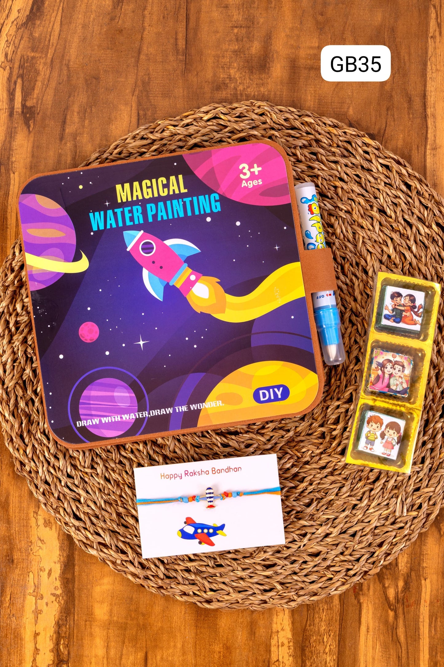 GB 33- GB 36 🎨 Raksha Bandhan Magical Water Painting Gift Set – Rakhi, Chocolates & Activity Book (Age 3+)