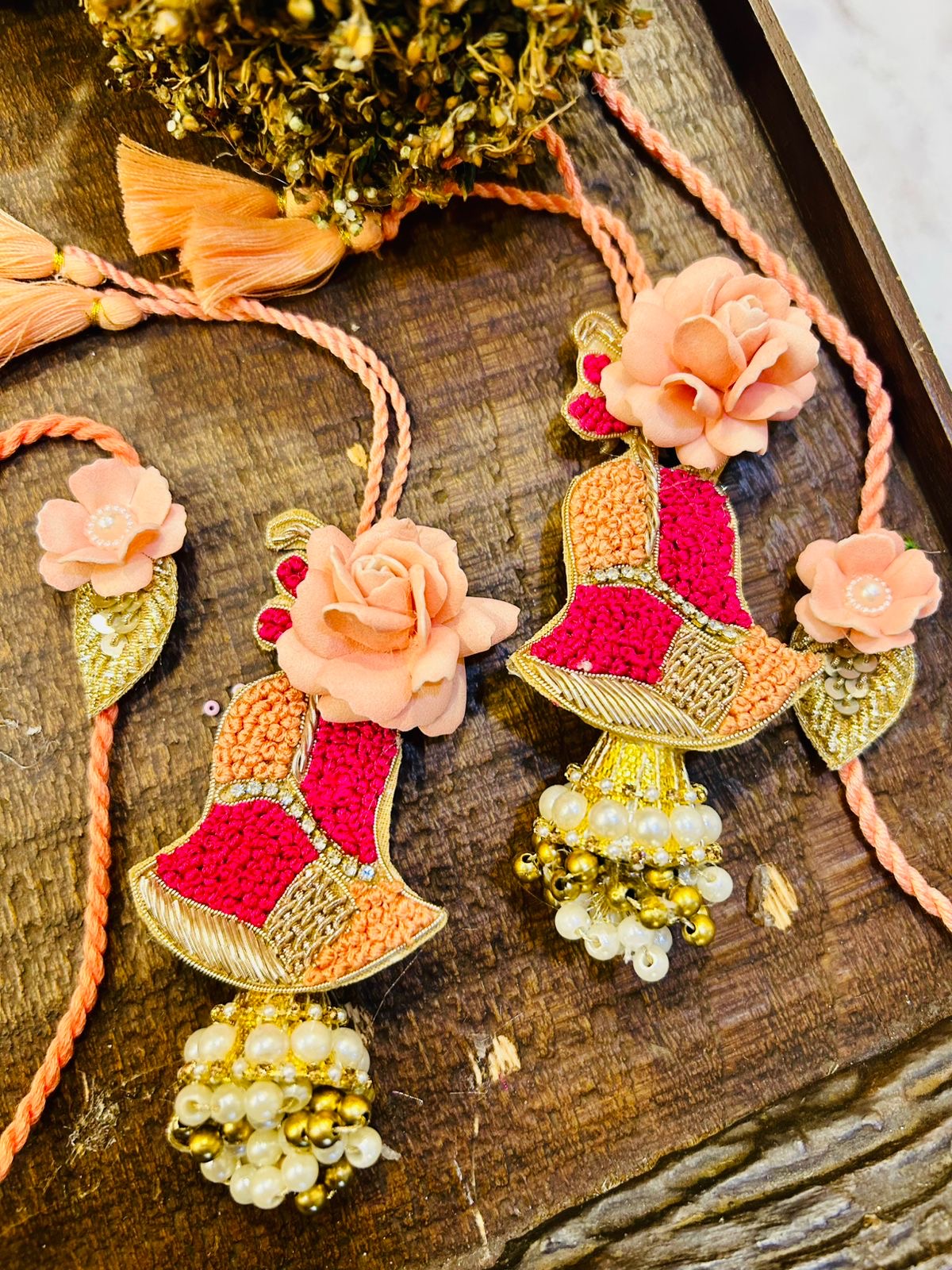 N-02 Pretty Peach Hand-Embroidered Rakhi Set – Elegant Bhai & Bhabhi Pair