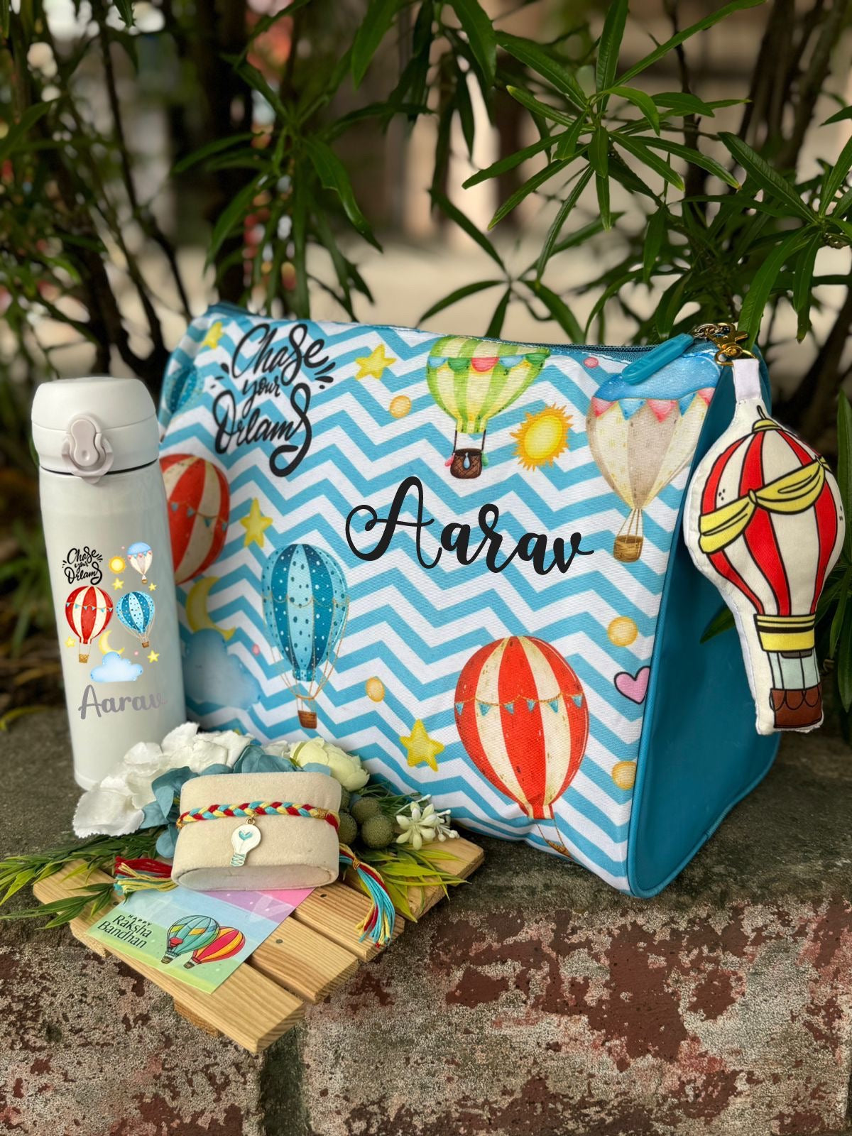 Customised Rakhi Gift Hamper with Name Bottle & Duffle Bag