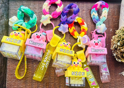 KN-36 Colourful pretty perfumed key chain lumbas done on reusable hair rubber bands  Double use  Keychain plus rubber bands for  240 each  🌸