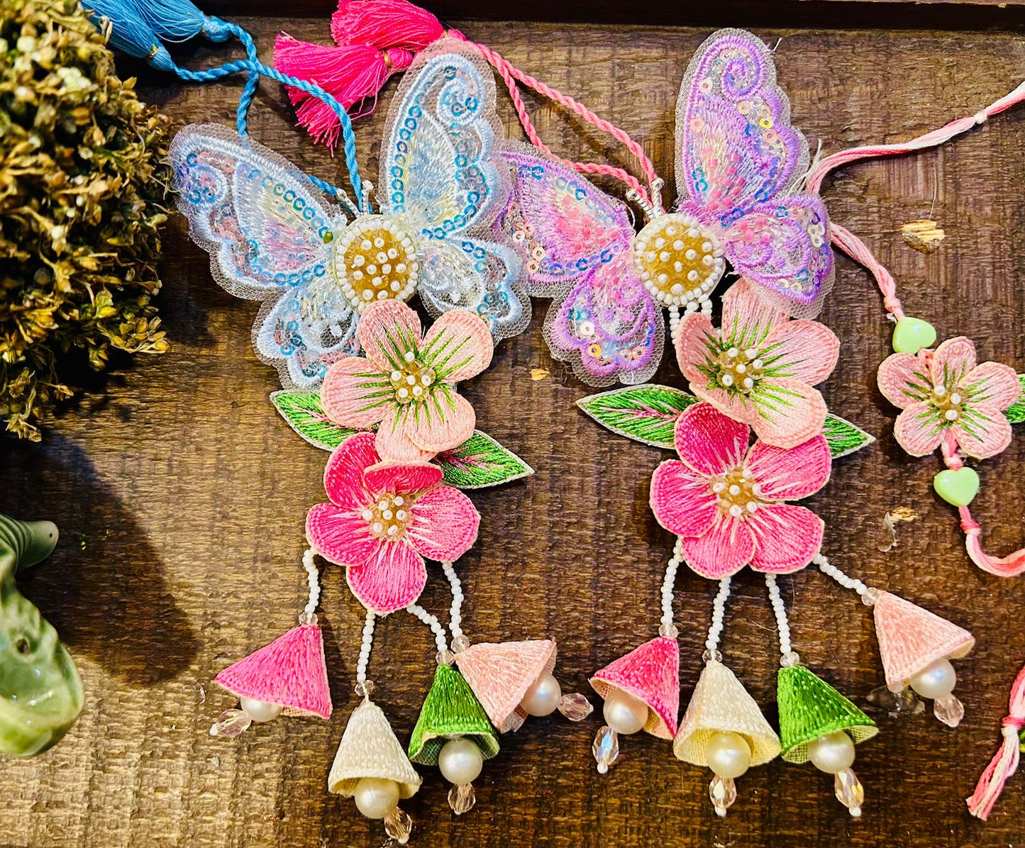 N-15 Hand-Embroidered Floral Lumba Rakhi – With Reusable Hair Clip for Bhabhi
