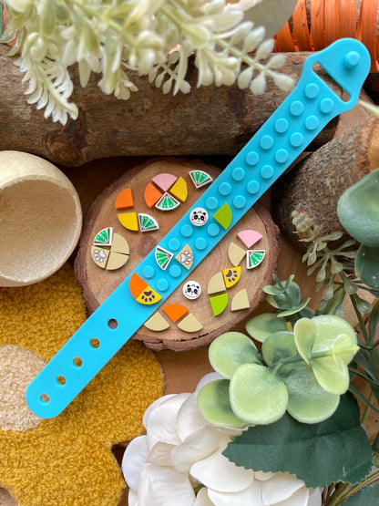💜 Colourful Puzzle Lego Wrist Band Rakhi – Limited Edition Silicone Rakhi for Kids