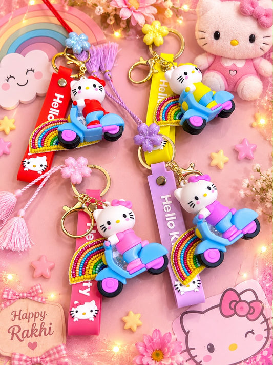 Four Hello Kitty-themed scooter keychains arranged on a pink decorative background with flowers, stars, and pastel props. Each keychain features a cartoon character riding a blue and pink scooter with a rainbow strap and a Hello Kitty tag.