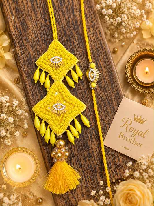 SEO Product Title
Yellow Evil Eye Bhai Bhabhi Lumba Rakhi Set |
