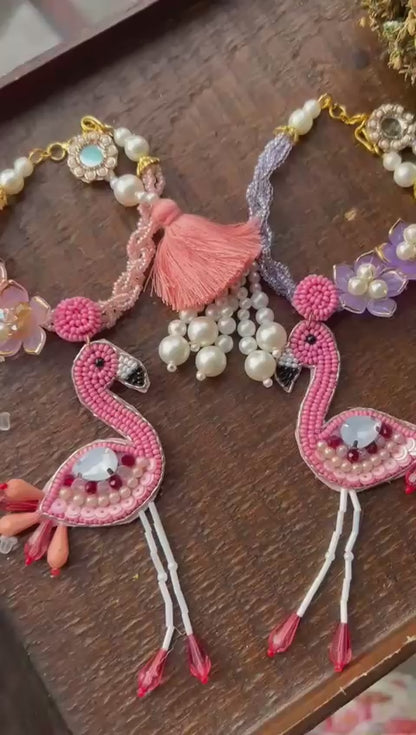 N-18 Flamingo Bracelet for Bhabhi – Intricate Handcrafted Lumba Rakhi with Charm Detail